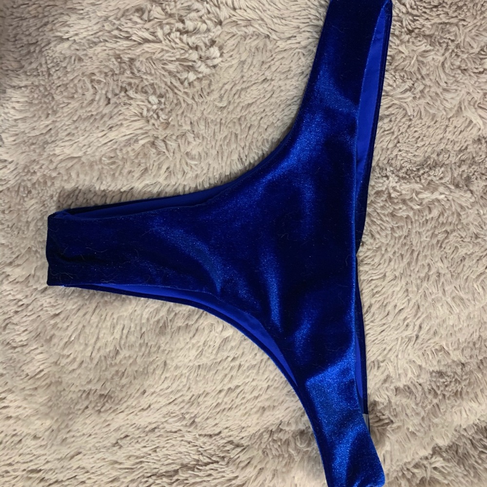 Dark blue thong swimsuit bottoms